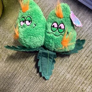 Vibrant Green Plush Toy with Orange Details